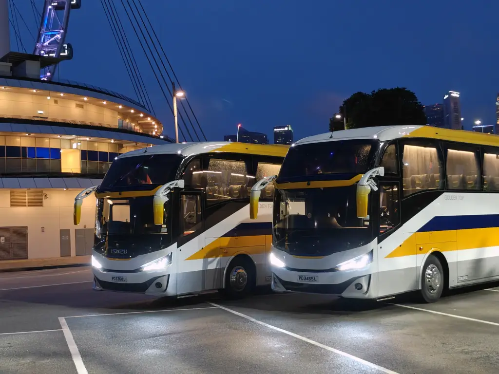 Golden Top Travel bus charter Singapore fleet on the road