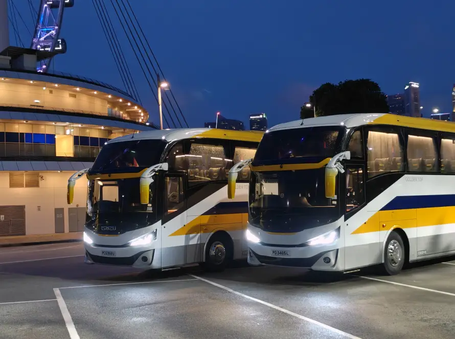Golden Top Travel bus charter Singapore fleet on the road